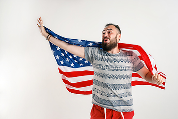 Image showing Young man with the flag of United States of America