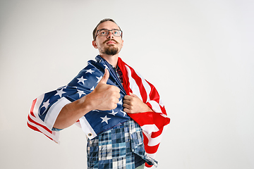 Image showing Young man with the flag of United States of America