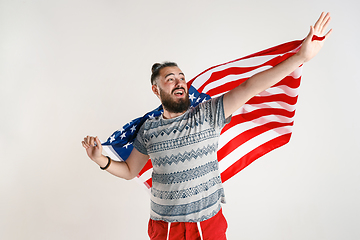 Image showing Young man with the flag of United States of America