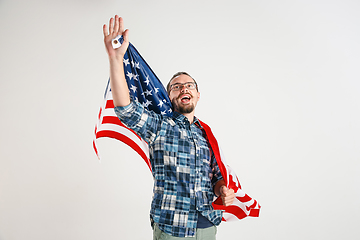 Image showing Young man with the flag of United States of America