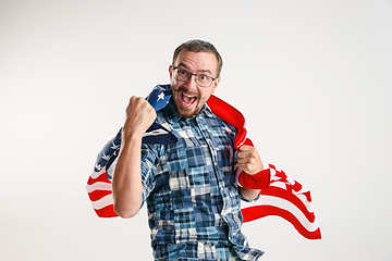 Image showing Young man with the flag of United States of America