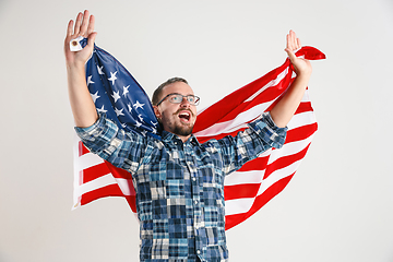 Image showing Young man with the flag of United States of America