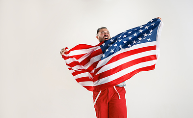 Image showing Young man with the flag of United States of America