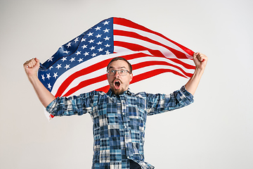 Image showing Young man with the flag of United States of America