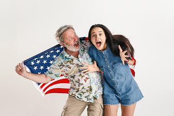 Image showing Senior man with the flag of United States of America