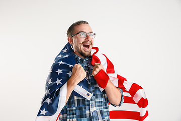 Image showing Young man with the flag of United States of America