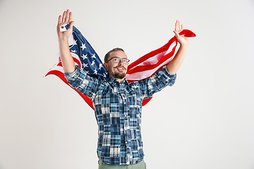 Image showing Young man with the flag of United States of America