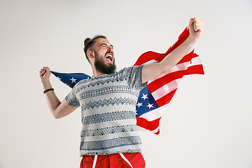 Image showing Young man with the flag of United States of America