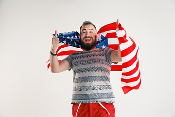 Image showing Young man with the flag of United States of America