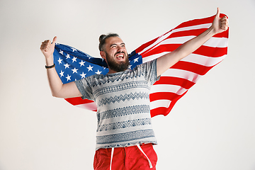 Image showing Young man with the flag of United States of America