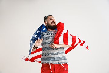 Image showing Young man with the flag of United States of America