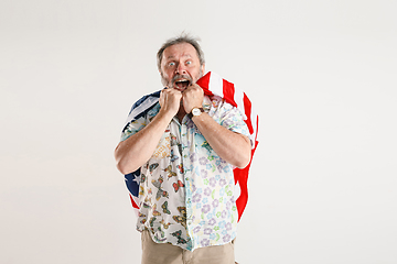 Image showing Senior man with the flag of United States of America