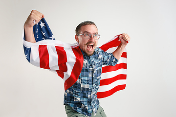 Image showing Young man with the flag of United States of America