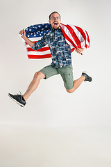 Image showing Young man with the flag of United States of America