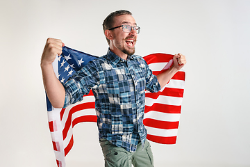 Image showing Young man with the flag of United States of America