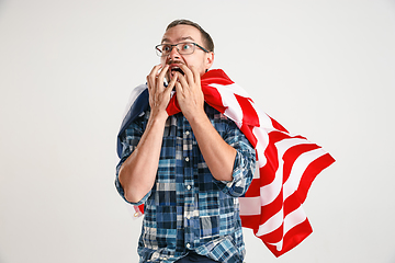 Image showing Young man with the flag of United States of America