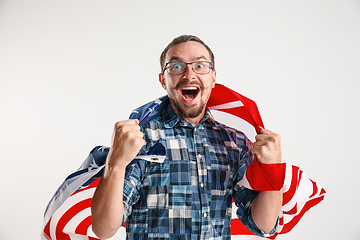 Image showing Young man with the flag of United States of America