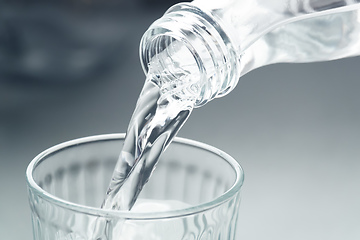 Image showing pour a glass of water