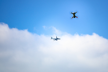 Image showing toy drone and airplane blue sky background 