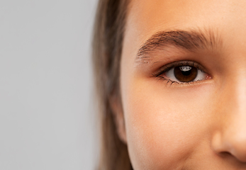 Image showing close up of teenage girl face with brown eyes