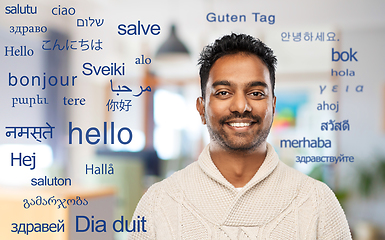 Image showing indian man over words in foreign languages