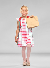 Image showing little student girl with school lunch in paper bag