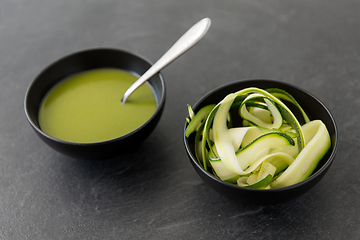 Image showing peeled or sliced zucchini and cream soup in bowl