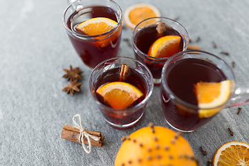 Image showing glasses of mulled wine with orange and cinnamon