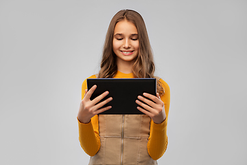 Image showing teenage girl using tablet computer