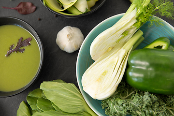 Image showing green vegetables and cream soup in ceramic bowl