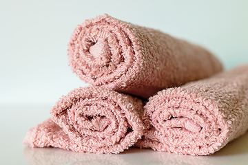 Image showing pink bath towel rolls