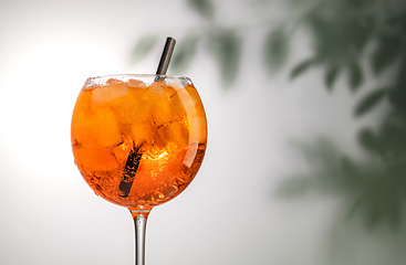 Image showing glass of orange cocktail