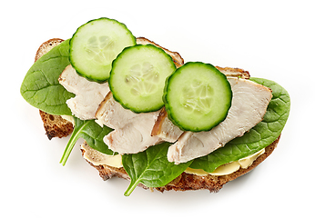 Image showing slice of bread with chicken meat and cucumbers