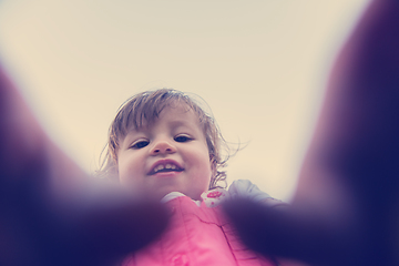 Image showing little girl spending time at backyard