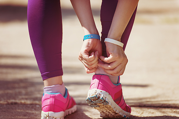 Image showing young female runner training for marathon