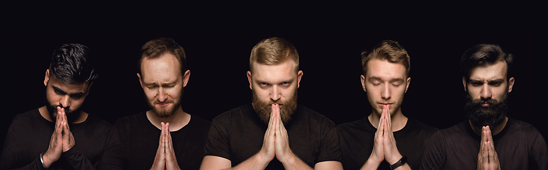 Image showing Close up portrait of young people isolated on black studio background