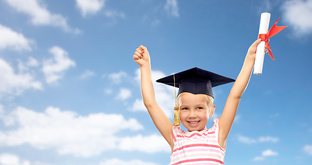 Image showing happy little girl in mortarboard with diploma