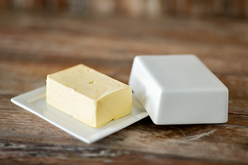 Image showing close up of butter on wooden table