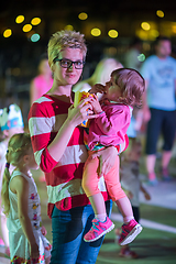 Image showing mother and little daughter in the kids disco