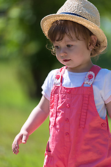 Image showing little girl runing in the summer Park