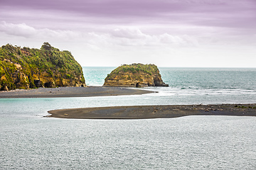 Image showing sea shore rocks and mount Taranaki, New Zealand