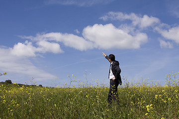 Image showing businessman pointing outdoor