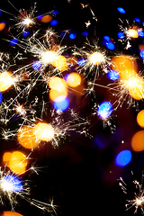 Image showing festive sparkler bokeh background