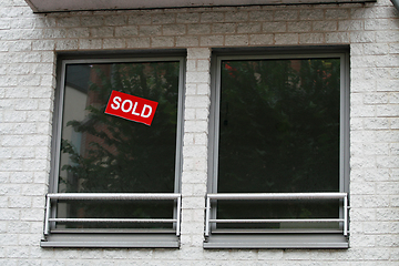 Image showing Sold sticker in window