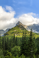 Image showing Polish Tatra mountains summer landscape with blue sky and white clouds.