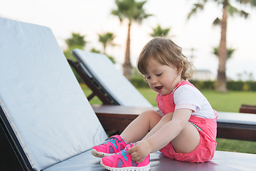 Image showing little cute girl enjoying summer vacations