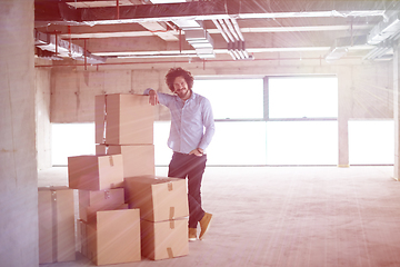 Image showing portrait of young businessman on construction site