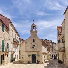 Image showing Small church on square of small urban village of Stari grad on Hvar island in Croatia, Adriatic Sea, Europe.