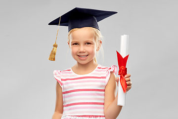 Image showing little girl in mortarboard with diploma