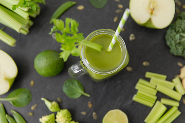 Image showing close up of glass mug with green vegetable juice